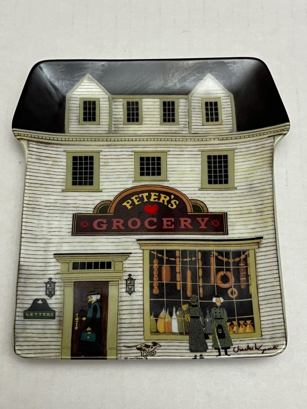 Peter's Grocery house-shaped decorative plate by Charles Wysocki.